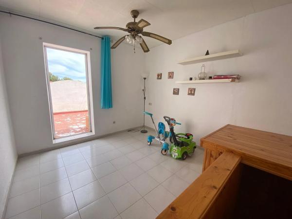 Chalet adosado en calle Laguna Verde, 80