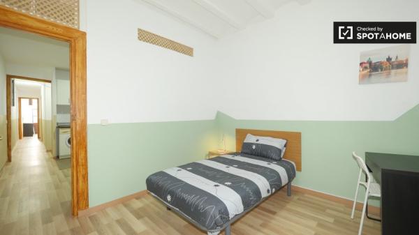Spacious room in 4-bedroom apartment in El Raval, Barcelona