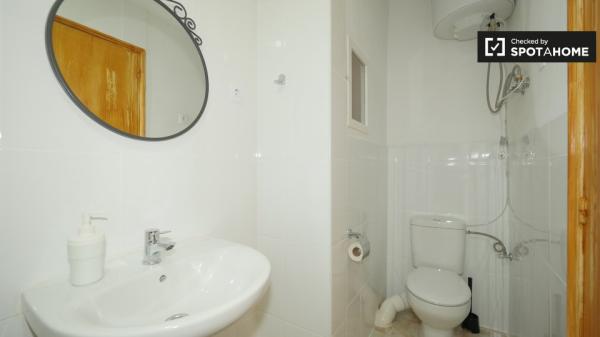 Spacious room in 4-bedroom apartment in El Raval, Barcelona