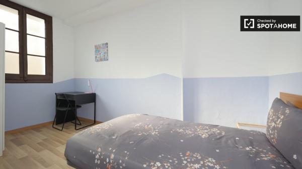 Spacious room in 4-bedroom apartment in El Raval, Barcelona