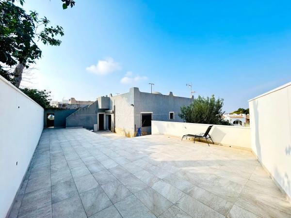 Chalet adosado en calle Acuario, 73