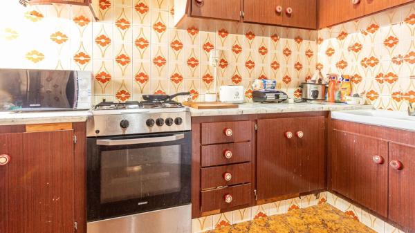 Edificio residencial en calle de la Bretxa Oberta a la Muralla per les Tropes de Felip V, 7