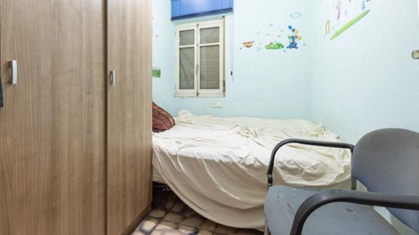 Edificio residencial en calle de la Bretxa Oberta a la Muralla per les Tropes de Felip V, 7