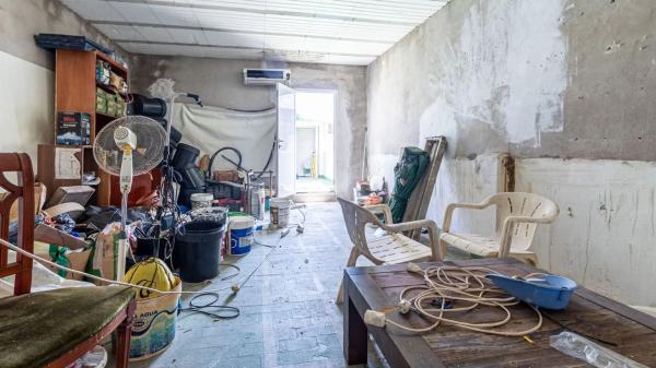 Edificio residencial en calle de la Bretxa Oberta a la Muralla per les Tropes de Felip V, 7