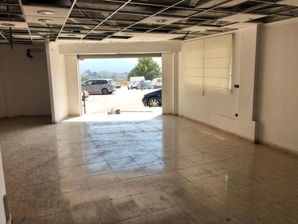 Local en calle Benidoleig, 18