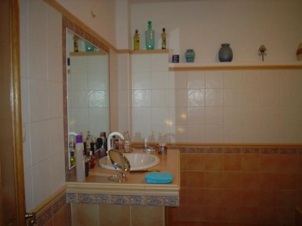 Chalet adosado en Nueva, 24