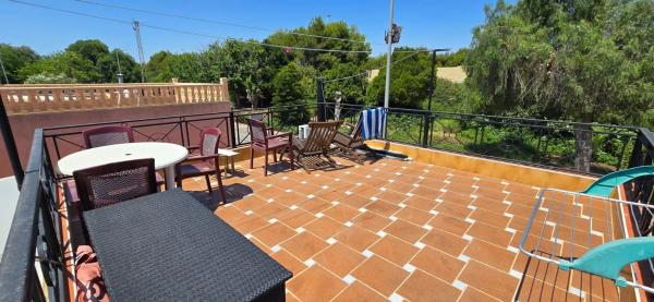 Chalet adosado en calle La Marina, 44