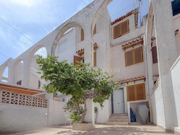 Chalet adosado en calle Manzana 3