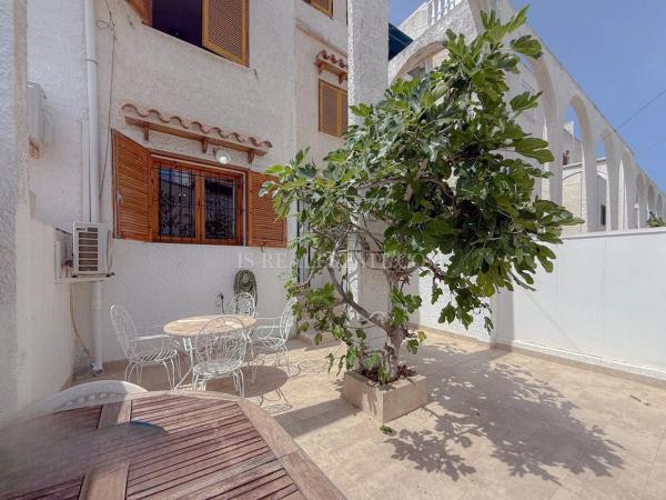 Chalet adosado en calle Manzana 3