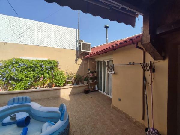 Chalet adosado en calle los Cincuenta, 46