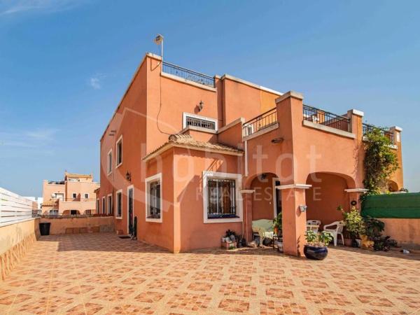 Chalet adosado en calle Algarrobo, 45 -39