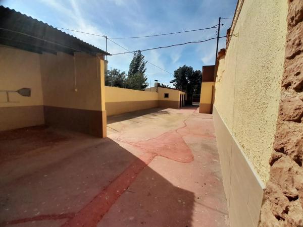 Finca rústica en via de servicio