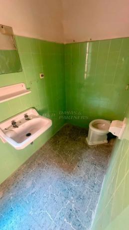 Edificio de uso mixto en calle 8 de Marzo