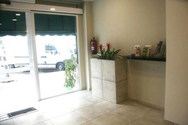 Edificio en avenida Dama d'Elx, 12