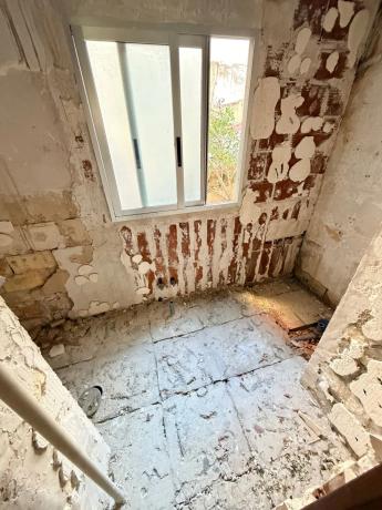 Edificio de uso mixto en calle Belando