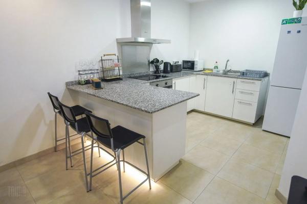 Edificio de uso mixto en calle Díaz Moreu