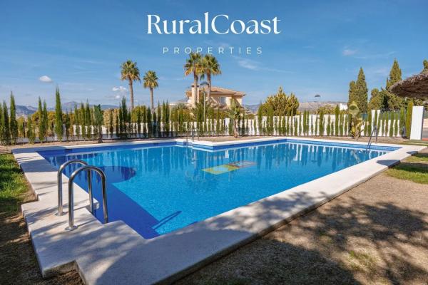 Chalet adosado en calle El Garrofer