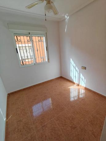 Chalet adosado en calle Amapola, 27