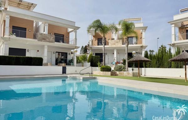 Chalet adosado en calle