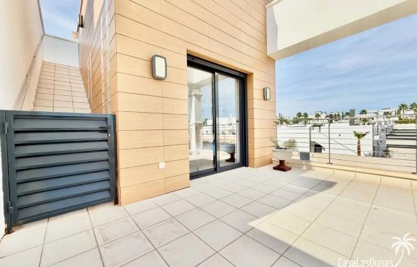 Chalet adosado en calle