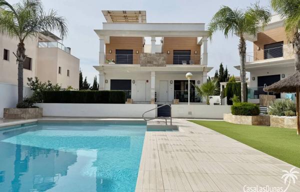 Chalet adosado en calle