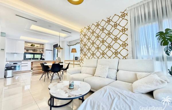 Chalet adosado en calle