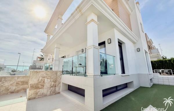 Chalet adosado en calle