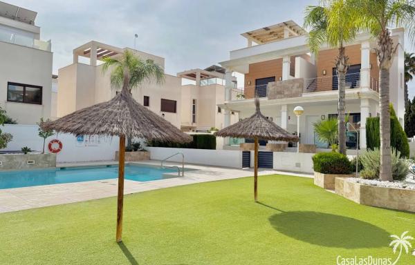 Chalet adosado en calle