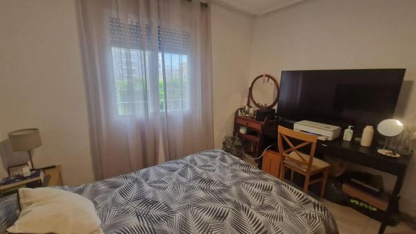 Chalet adosado en calle Talía, 33