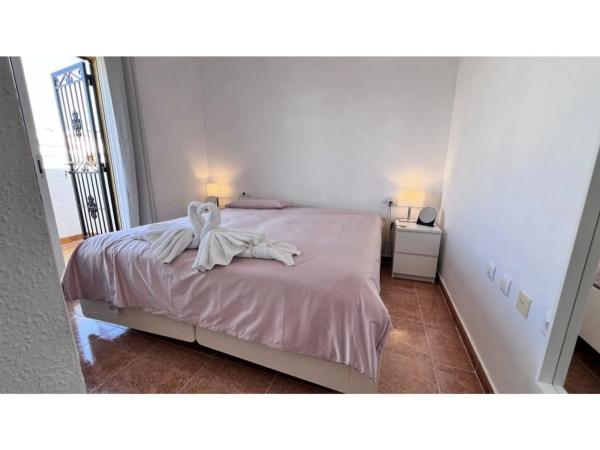 Chalet adosado en calle Manzano