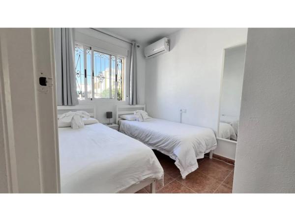 Chalet adosado en calle Manzano