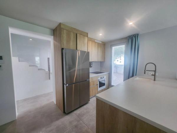 Chalet adosado en calle Milano, 24