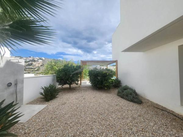 Chalet adosado en calle Milano, 24