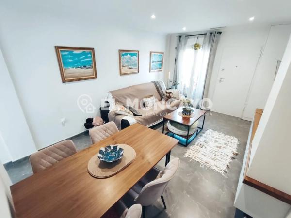 Chalet adosado en calle Corts Valencianes