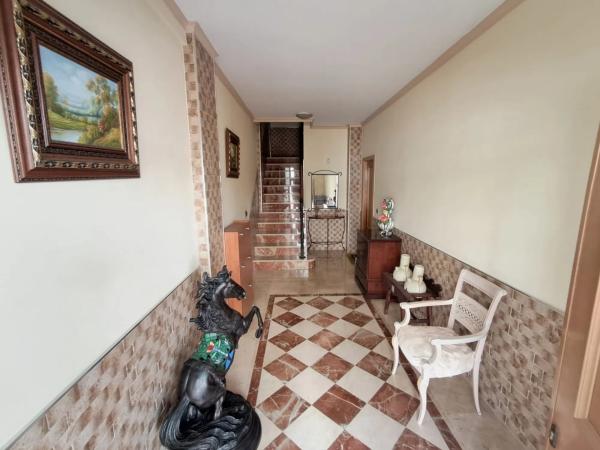 Chalet adosado en avenida Porvilla, 44