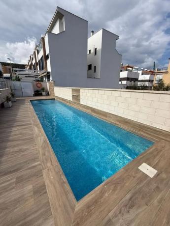 Chalet adosado en calle Carcaixent, 2