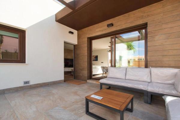 Chalet adosado en calle la Herrada, 61