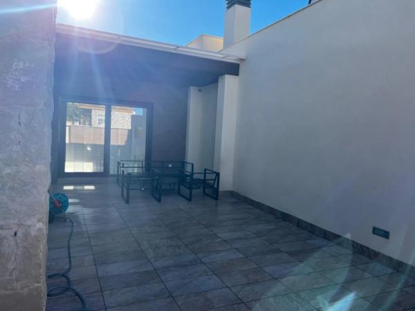 Chalet adosado en calle la Herrada, 61