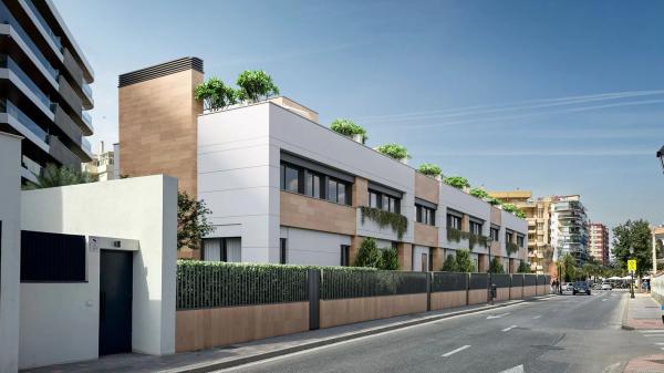 Chalet adosado en avenida Santa Amalia, 15