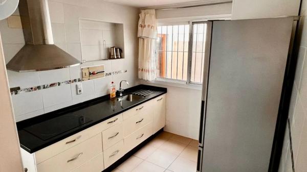 Chalet adosado en calle Miguel Márquez